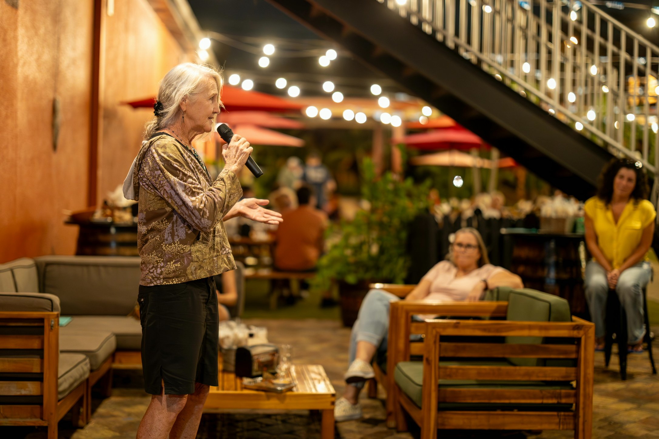 joanie regan speaking at a surfrider space coast meeting
