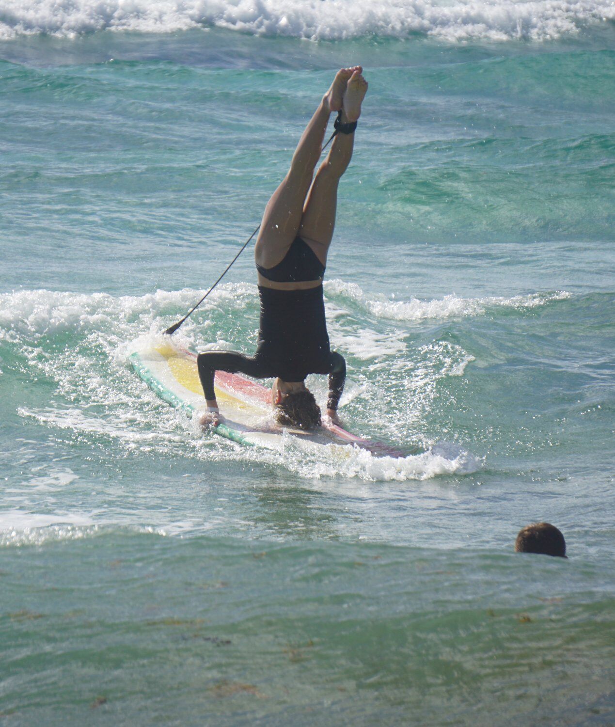 surf headstand - picture from TripAdvisor